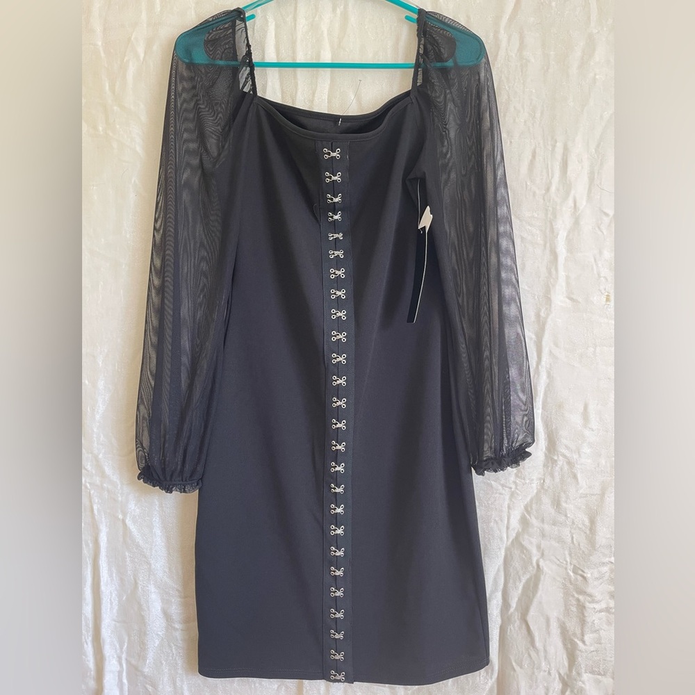 New tags Minette Sz LG. Blk cute dress. Sheer sleeves/eyelet closure 30” long